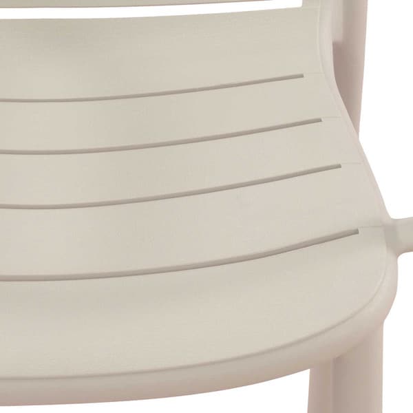 Cream patio stacking chairs